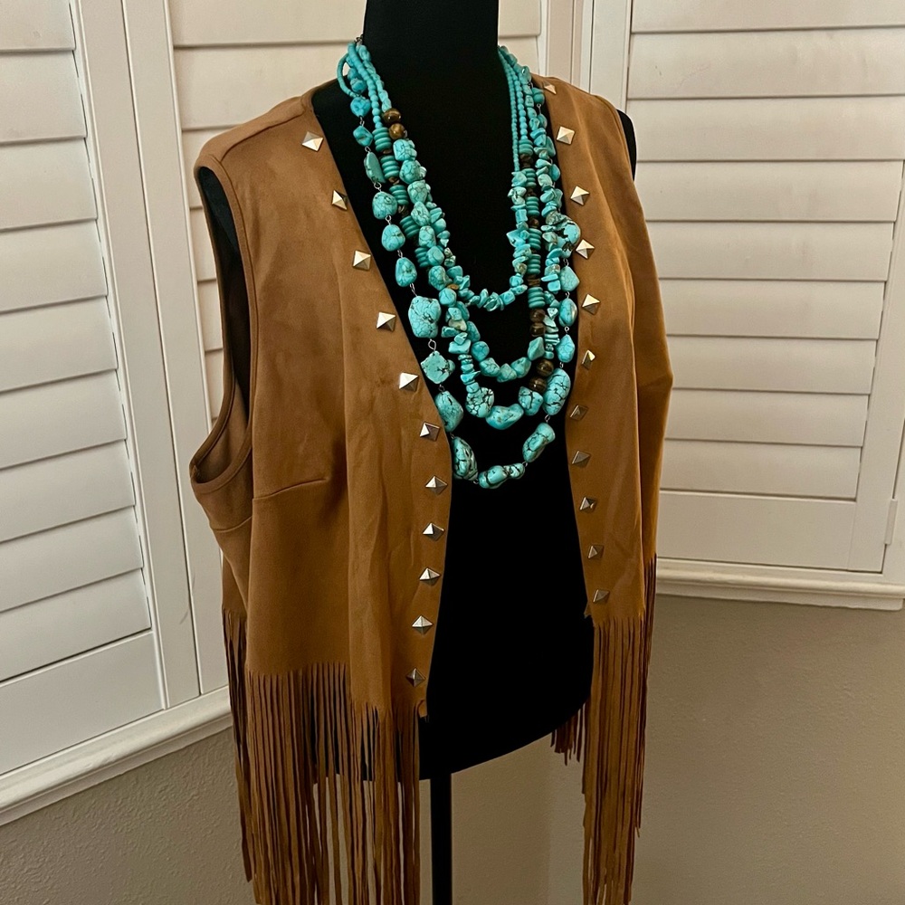 Amazon tan studded fringe western vest.